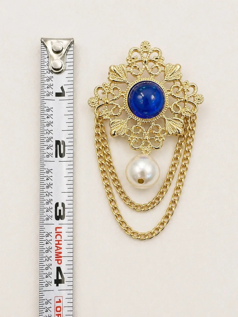 Vintage Style Gold Tone Filigree Blue Cabochon Faux Pearl Dangle Chain Brooch